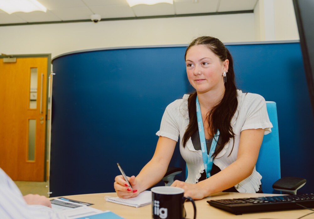 A customer meeting with an Islands Insurance advisor to get bereavement support and help with policies.