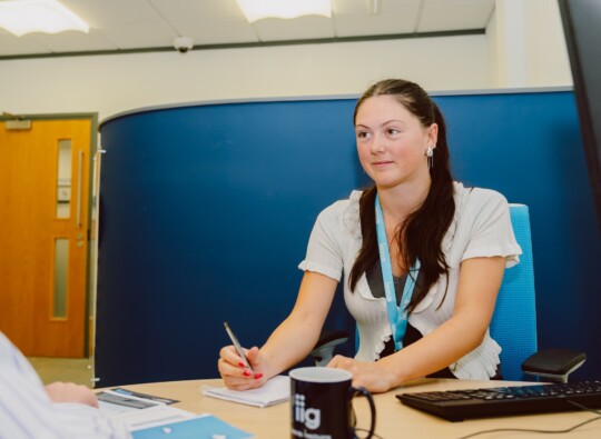 A customer meeting with an Islands Insurance advisor to get bereavement support and help with policies.